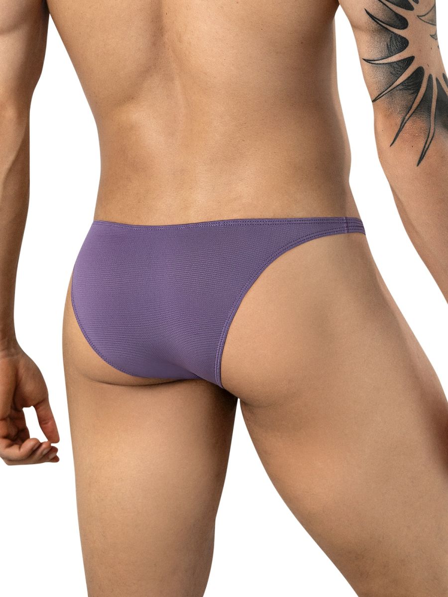 Rear view of lilac briefs featuring textured fabric on a person.
