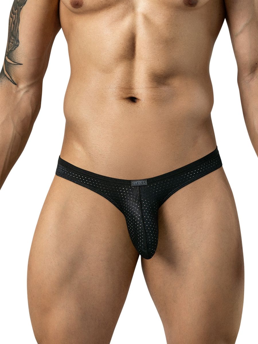 A model wearing black mesh briefs with a thin waistband and small logo tag.