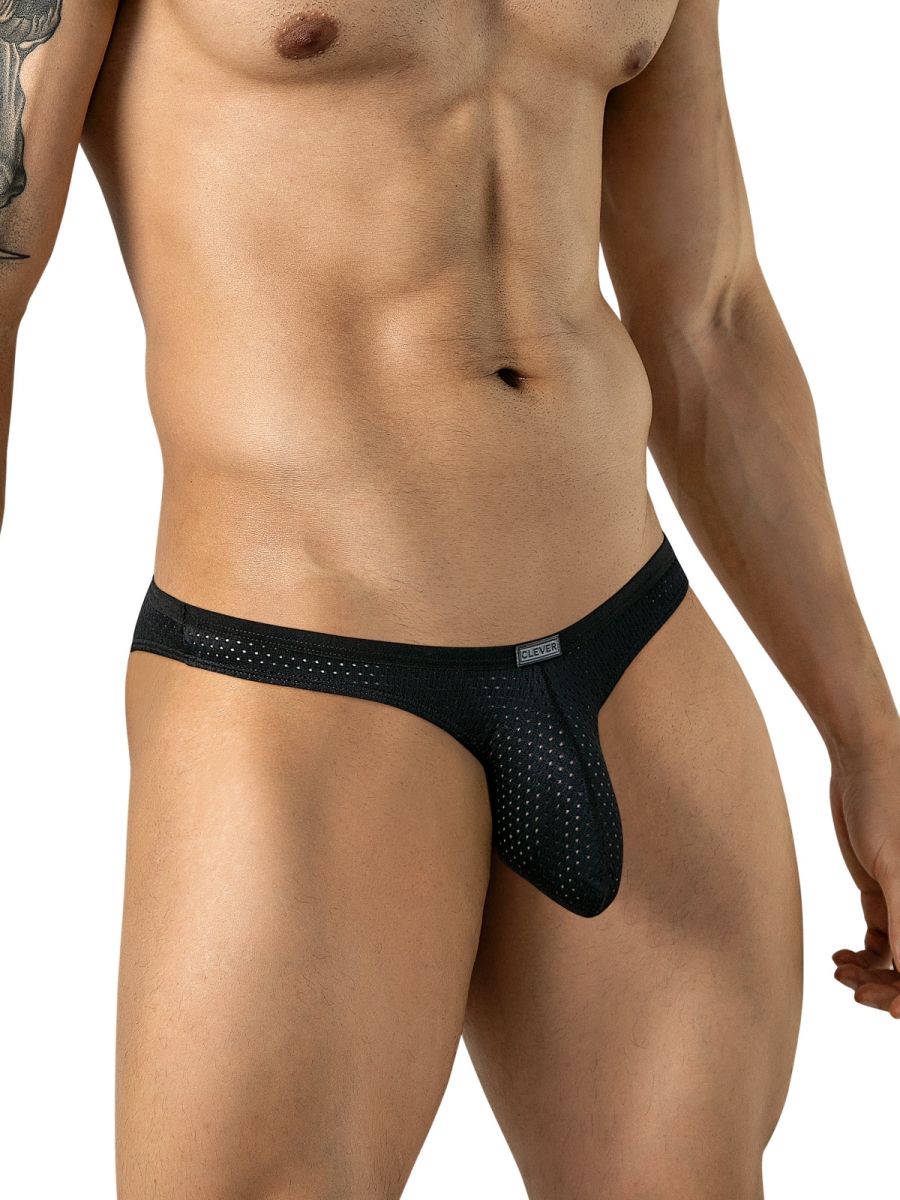A model wears black mesh brief-style underwear with a small logo tag on the waistband.