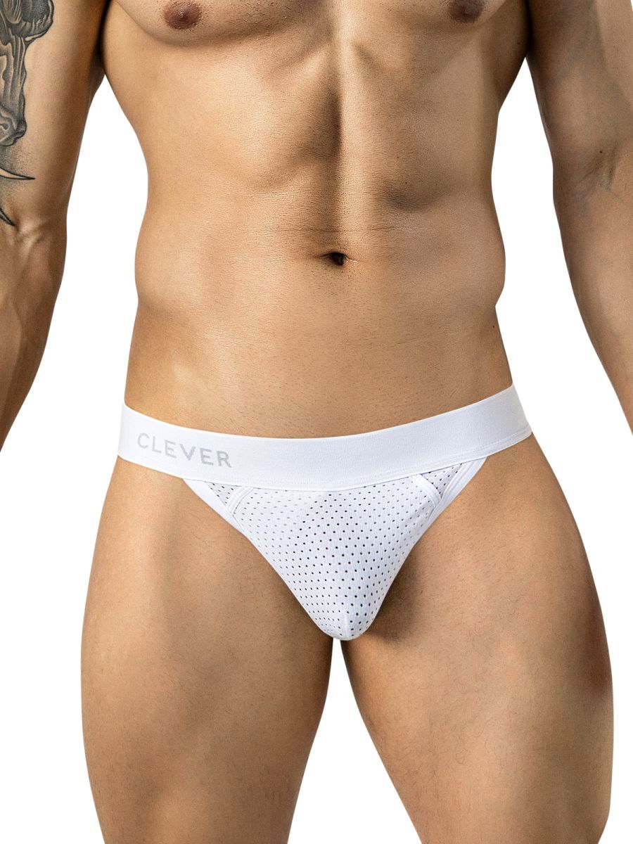 Front view of a person wearing white mesh thong underwear with a logo waistband.