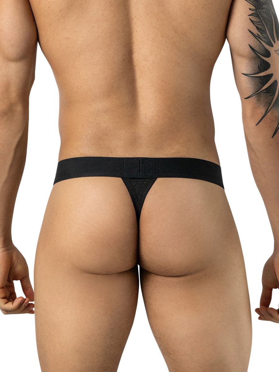 Rear view of a person wearing a black thong with a wide waistband.