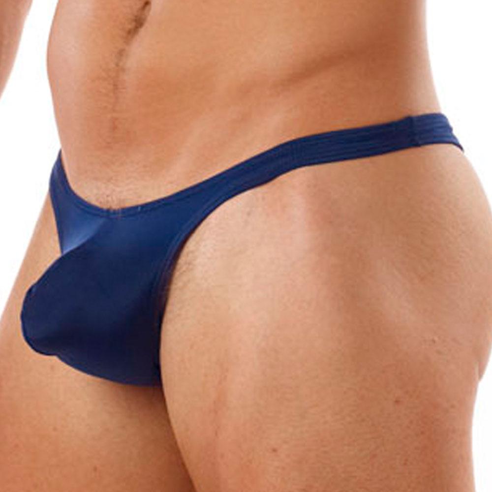 Deep blue form-fitting cover male cm202 thong made of smooth stretchy fabric showing the back side