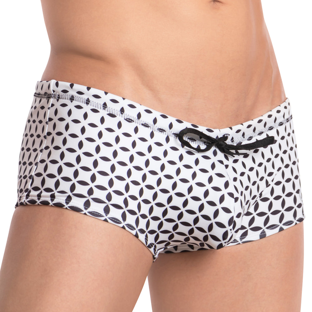Cover male cmh008 swimwear white swim trunks with black geometric leaf pattern and matching black drawstring waistband