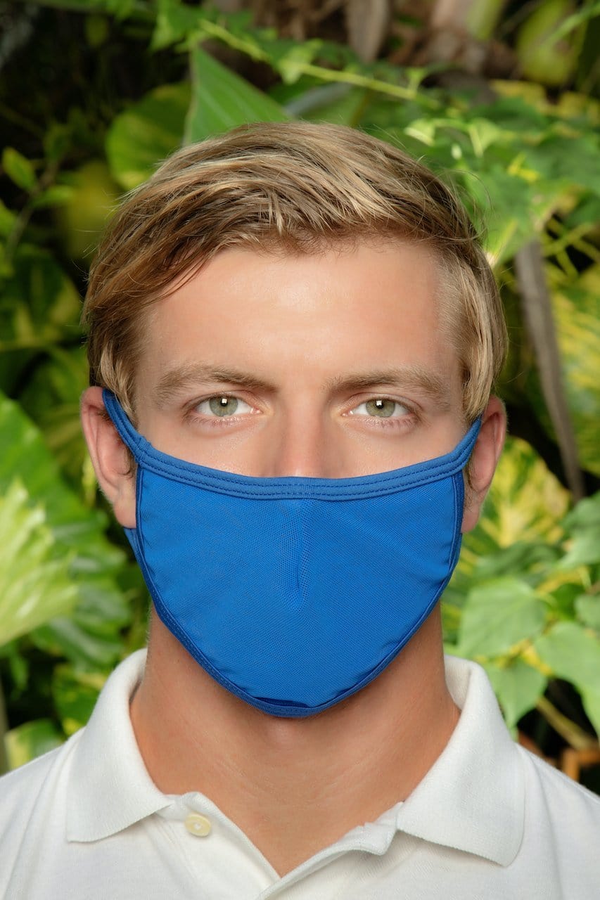 A vibrant royal blue Cover Male TAP003 fabric face mask with smooth textured surface and elastic ear loops