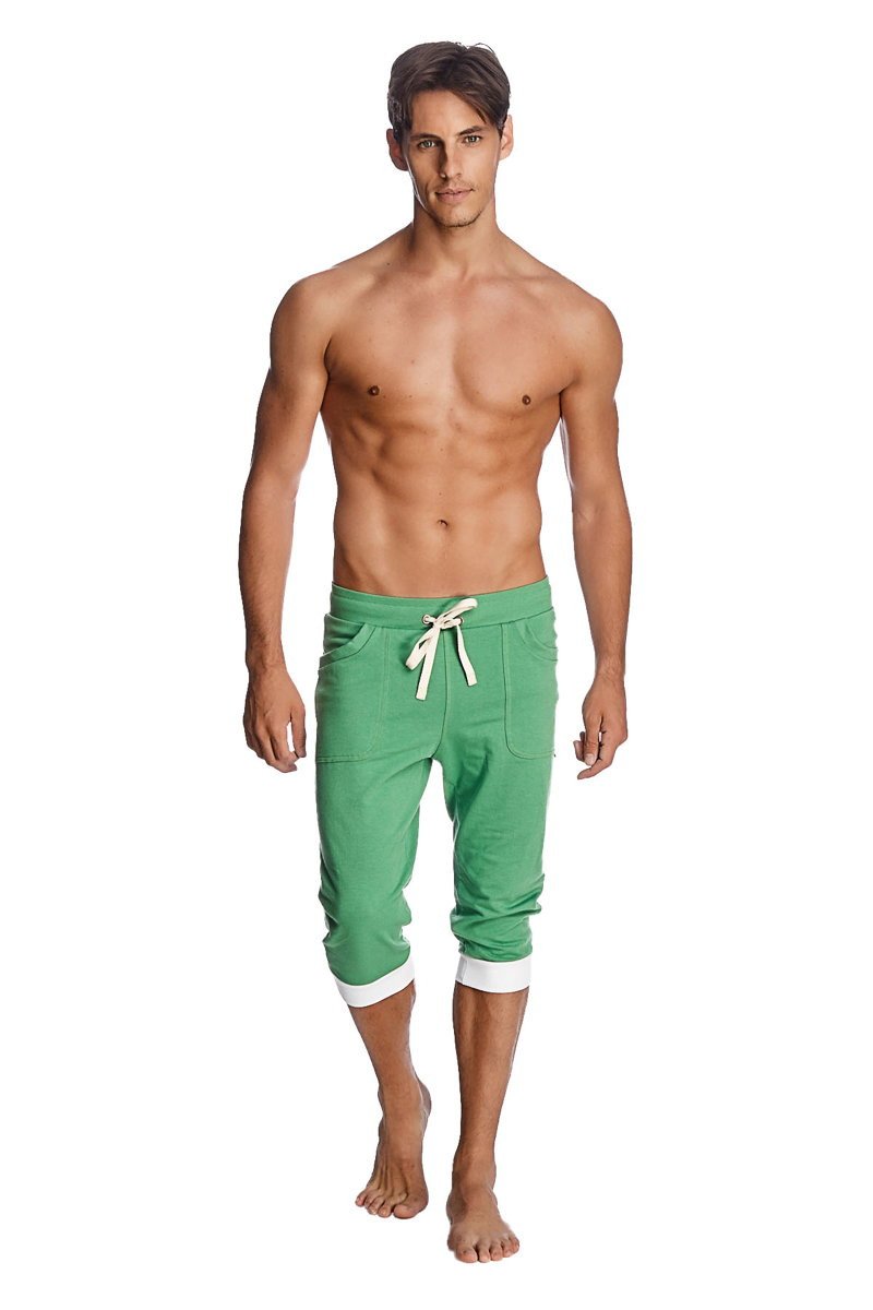 Green cropped cuffed yoga pants with white drawstring and cuffs made from bamboo bamboo green material