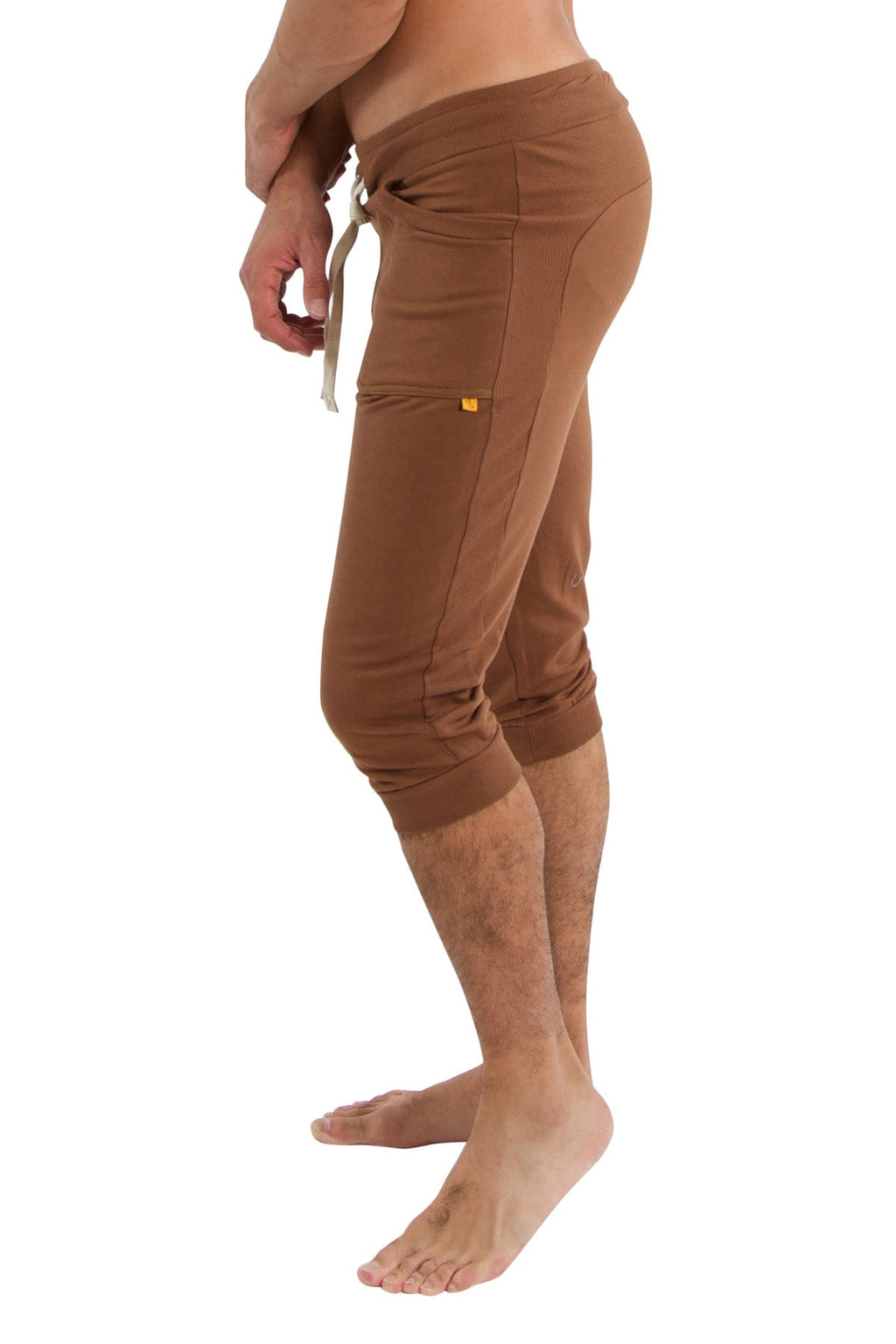Brown cuffed yoga pants with drawstring waistband and side pockets in solid chocolate for athletic use