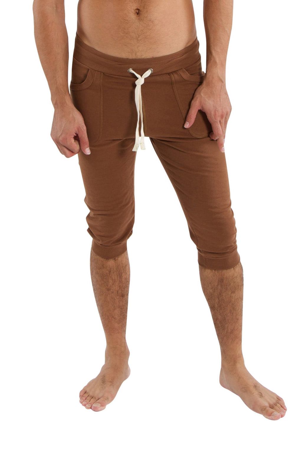 Brown cuffed yoga pants with drawstring waist and side pockets in solid chocolate for comfortable activewear
