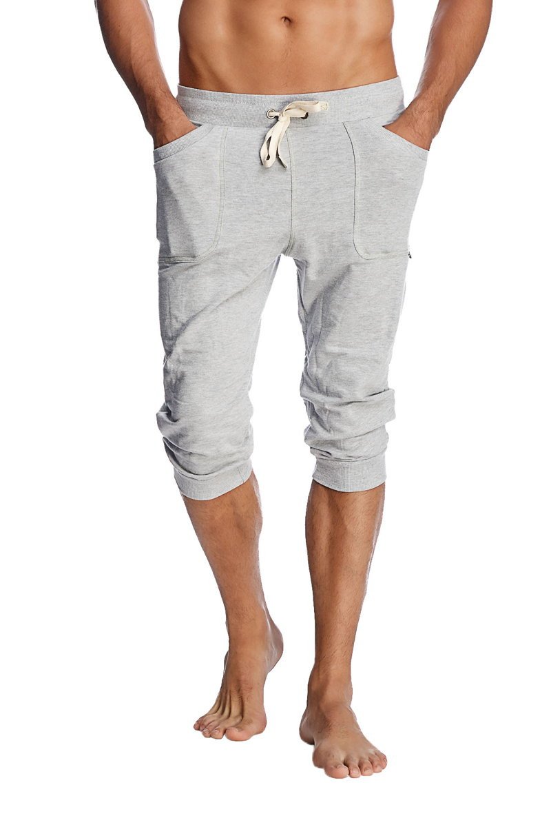 Gray heathered cuffed yoga pants with drawstring waist and rolled cuffs in jogger-style capri length