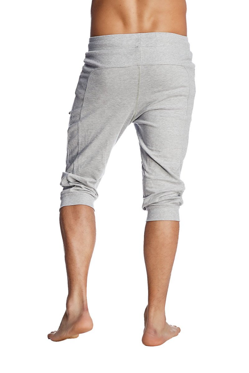Gray heathered cuffed yoga pants with rolled cuffs and side pockets designed for comfortable activewear