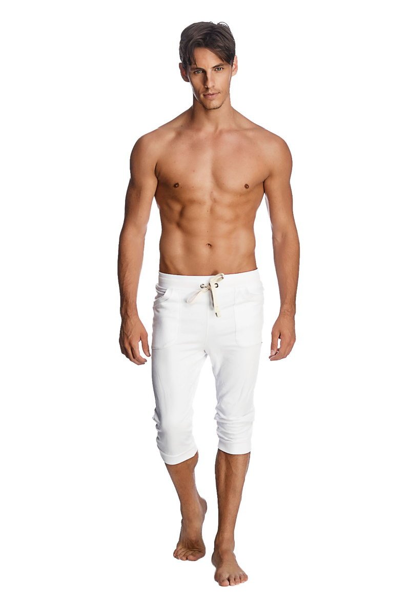 White capri-length cuffed yoga pants with drawstring waistband in solid white for comfortable activewear
