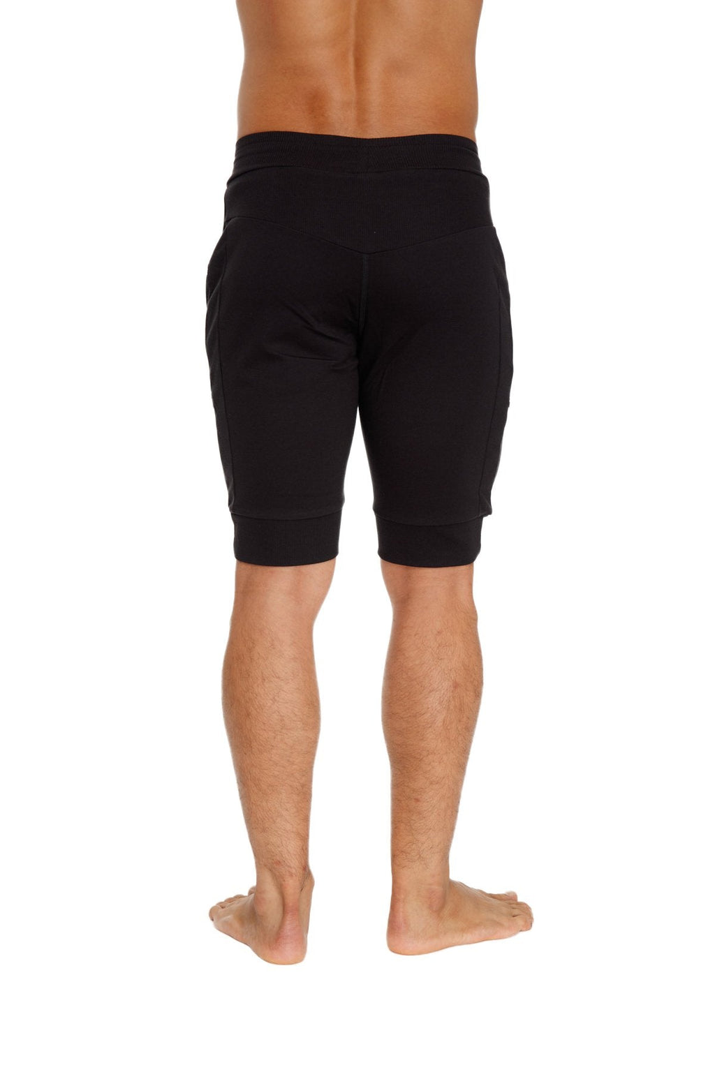 Black cuffed yoga shorts with comfortable elastic waistband and ribbed cuffs for athletic wear