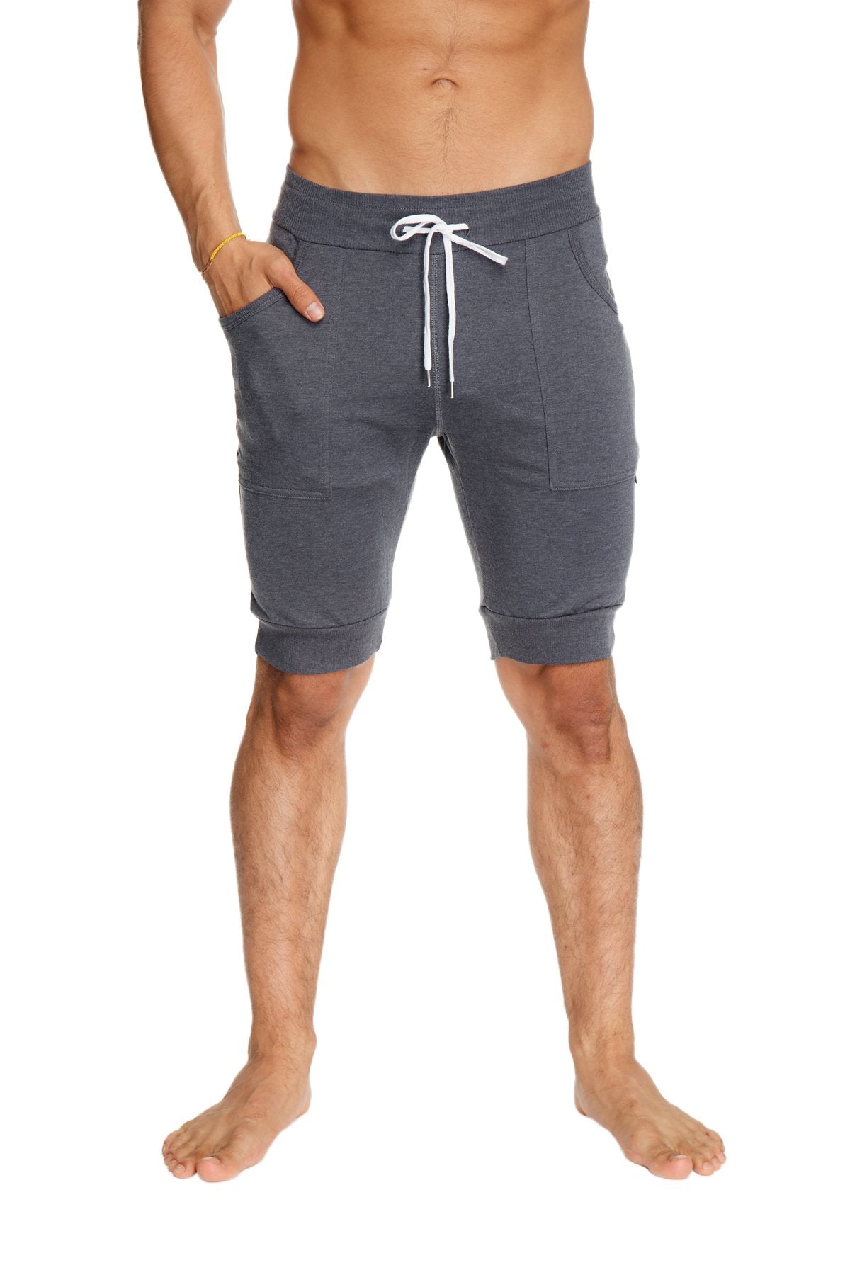 Charcoal cuffed yoga shorts with white drawstring and side pockets designed for athletic wear