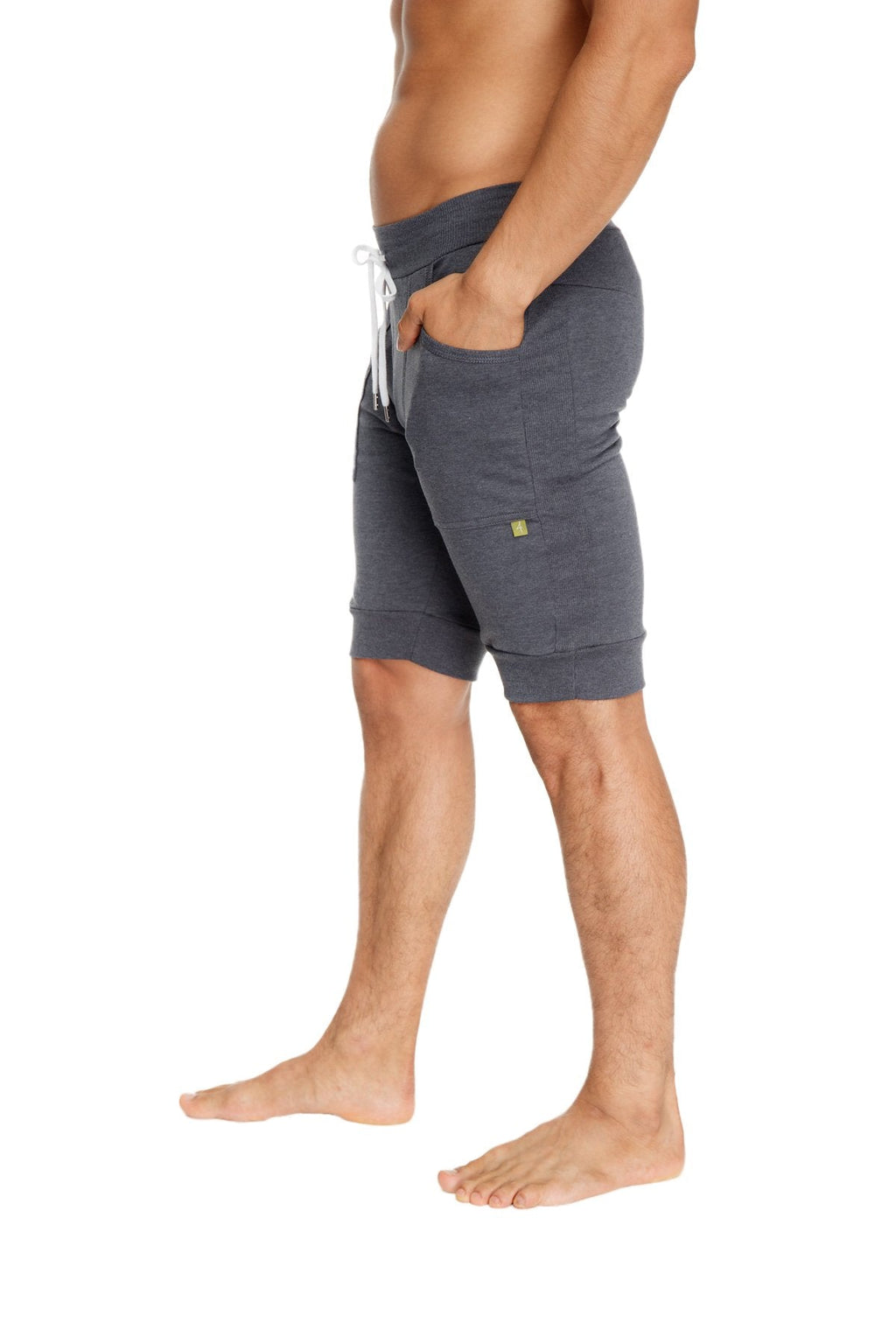 Cuffed yoga short charcoal gray heathered jogger shorts with white drawstring and green logo on thigh