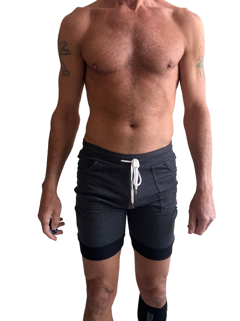 Charcoal cuffed yoga shorts with black hem trim and white drawstring designed for athletic use