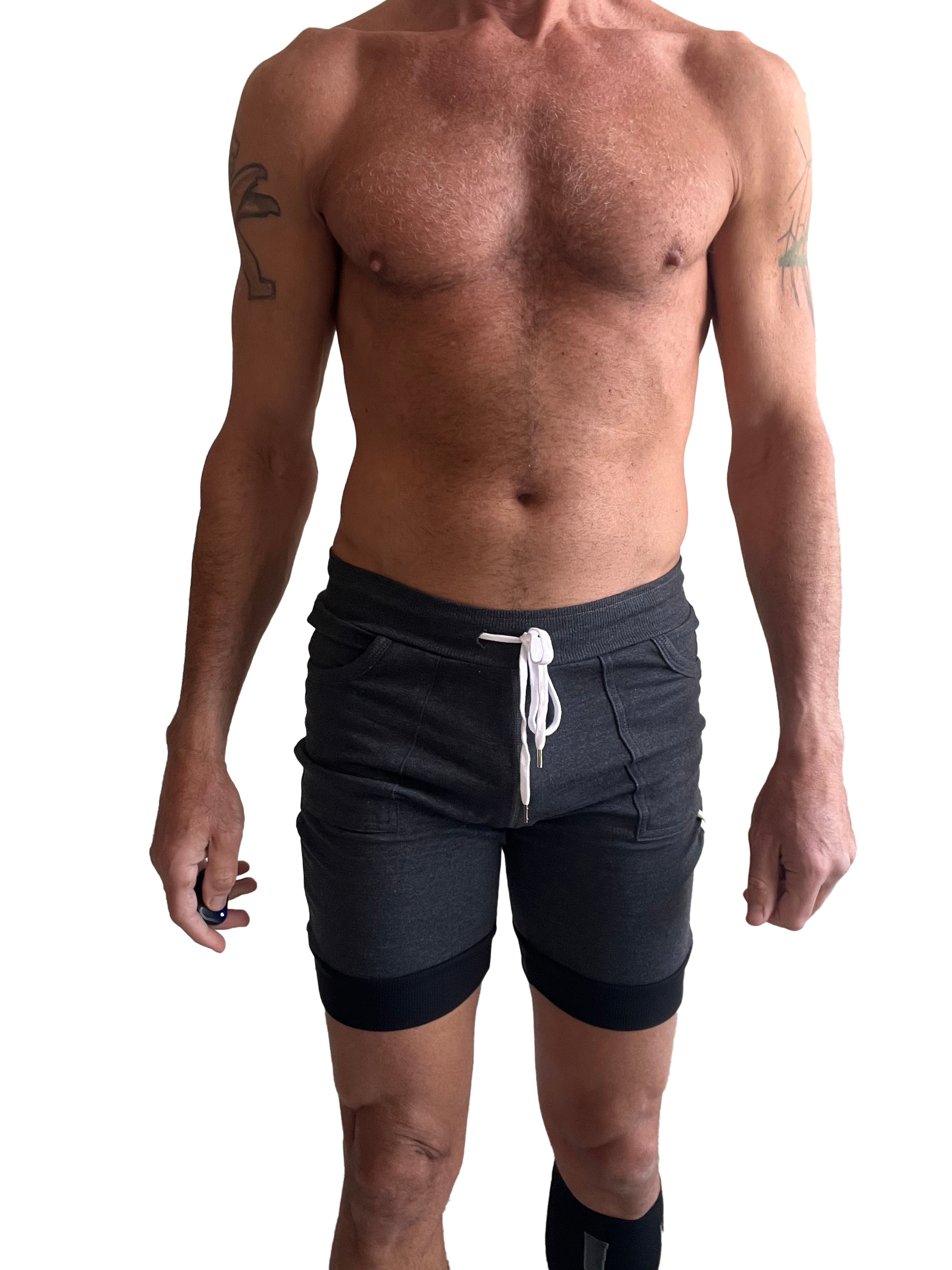 Charcoal cuffed yoga shorts with black hem trim and white drawstring designed for athletic use