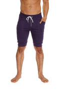 Navy blue cuffed yoga shorts with white drawstring and side pockets for athletic and casual wear