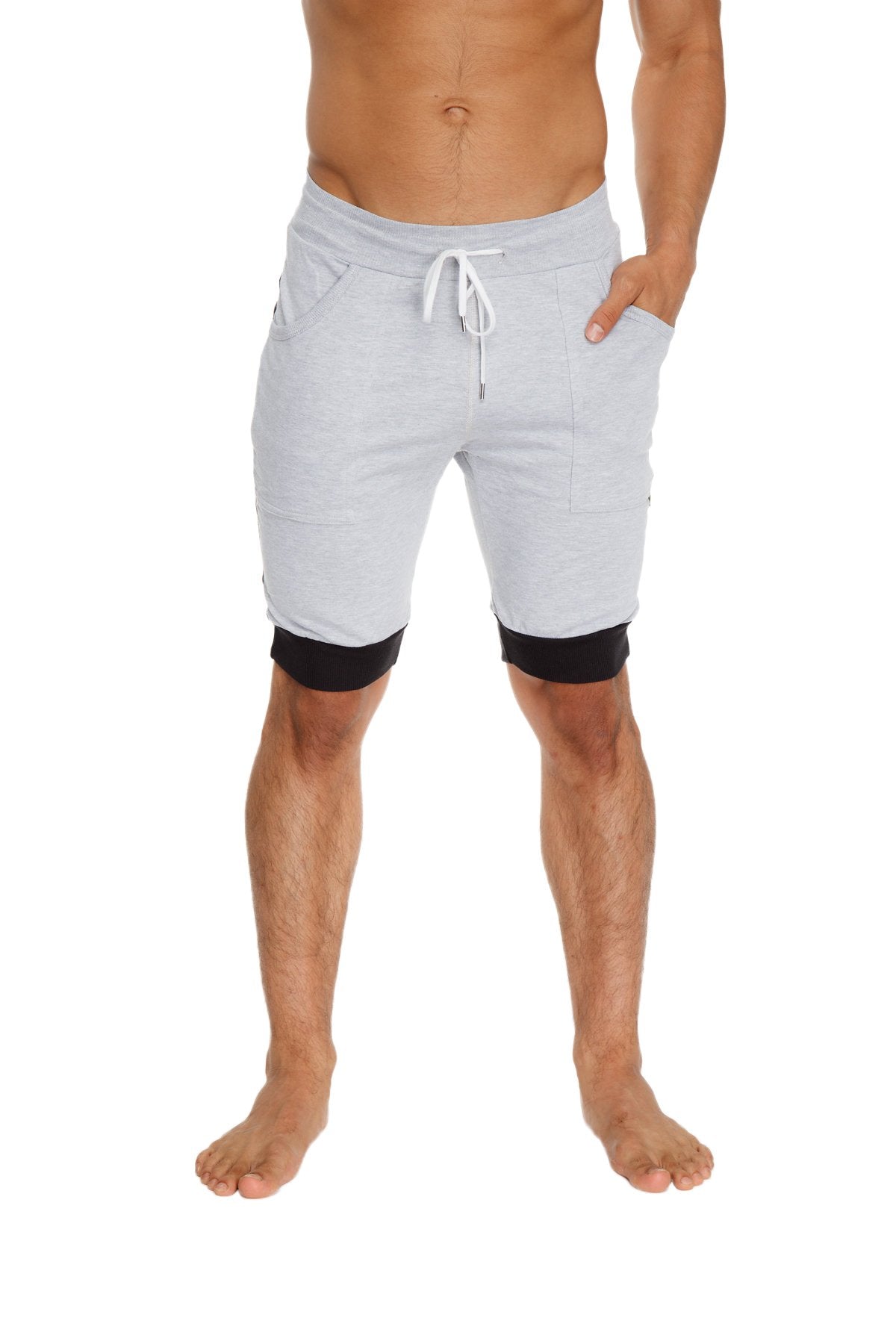 Light gray cuffed yoga shorts with black trim and white drawstring waistband ideal for athletic use