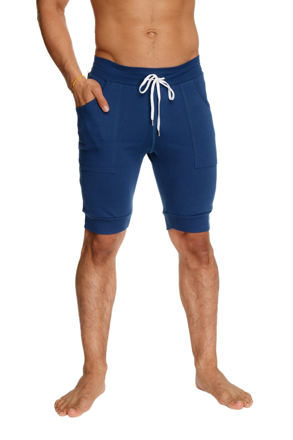 Cuffed yoga short in royal blue with navy blue fabric white drawstring and side pockets for athletic use