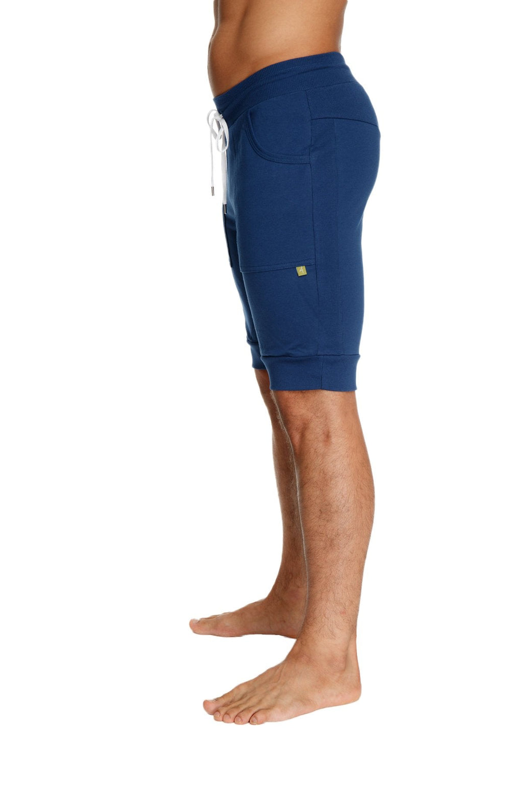 Navy blue cuffed yoga shorts with white drawstring and side pockets designed for athletic and casual wear