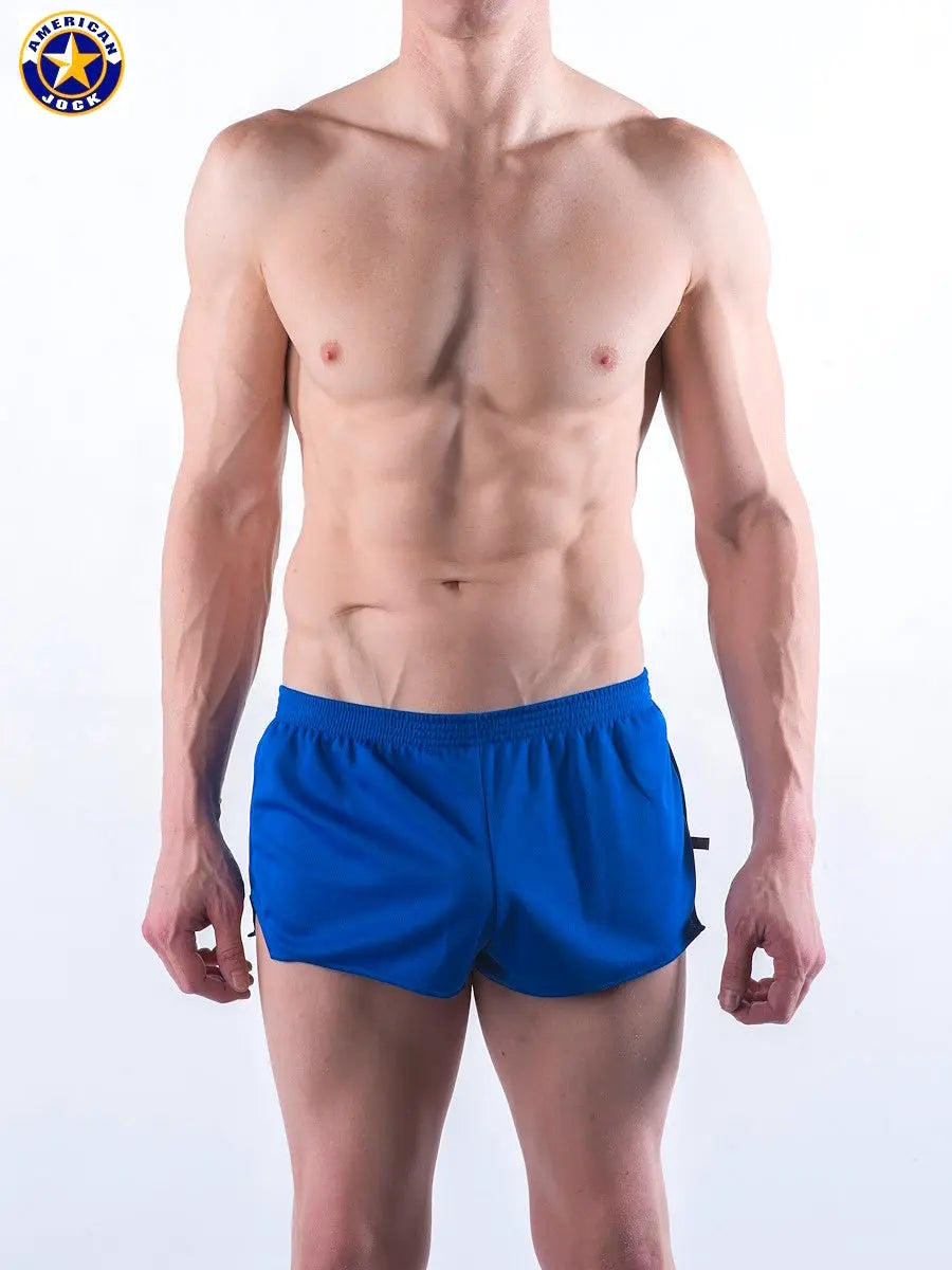 Royal blue men's running shorts by AMERICAN JOCK featuring a lightweight fabric and elastic waistband shown on a model.