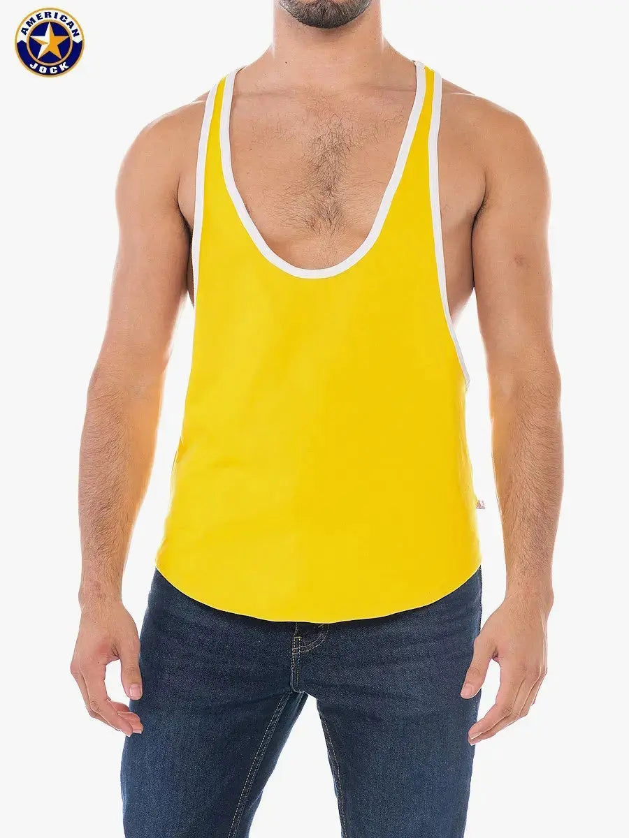 Gold yellow men's sports stringer tank top by AMERICAN JOCK featuring a deep neckline and white trim worn by a model.