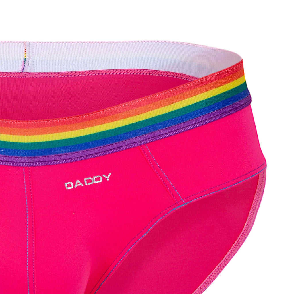 Bright pink daddy ddj027 brief with rainbow-striped waistband and white embroidered brand name for men