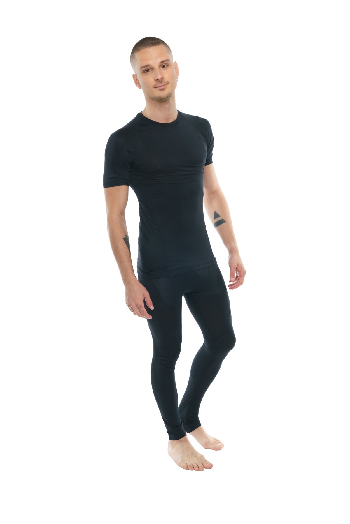 Black short-sleeved compression raglan crew-neck tee and matching leggings set in carbon black for activewear