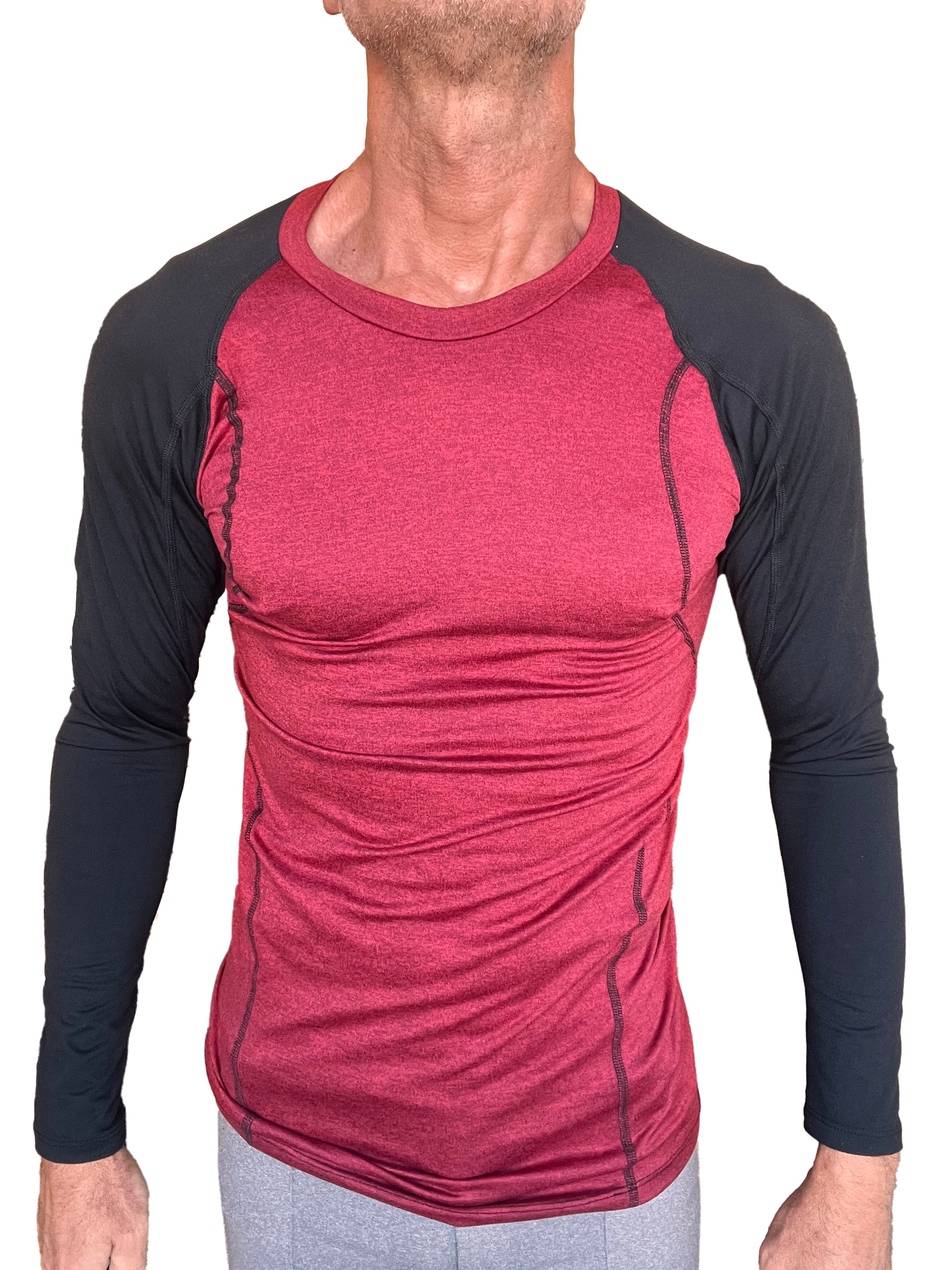 Men’s designer raglan crew-neck long sleeve shirt with red heathered torso black sleeves and subtle seam detailing
