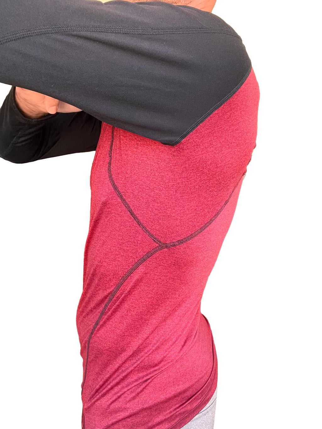 Designer raglan crew-neck long sleeve tee in brick with black sleeves featuring textured fabric and reinforced seams