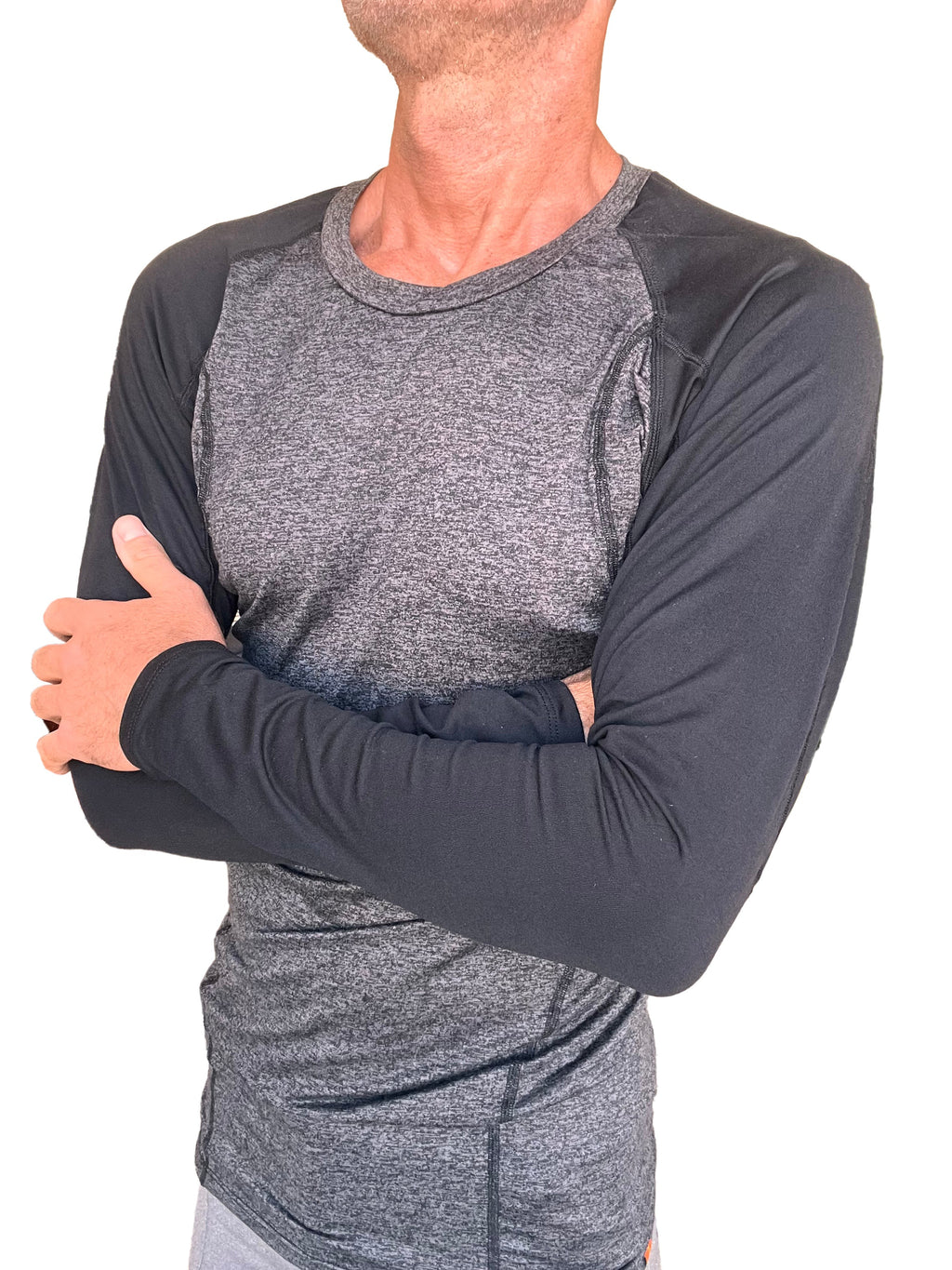 A men’s long-sleeved athletic raglan crew-neck tee in charcoal heather gray with black sleeves