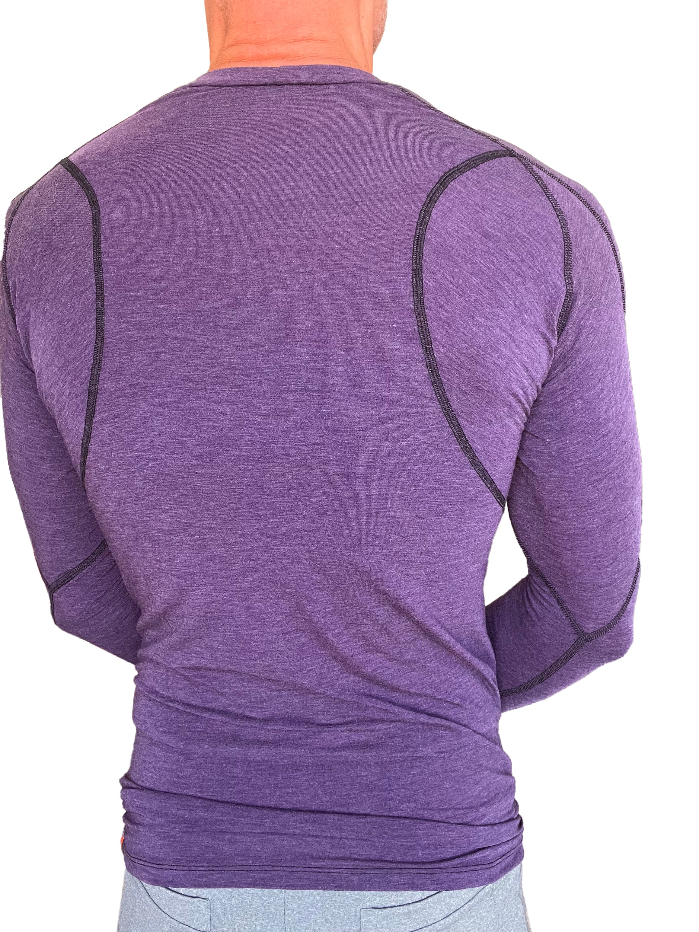 Designer raglan crew-neck long sleeve tee in eggplant purple with black seams and heathered fabric texture