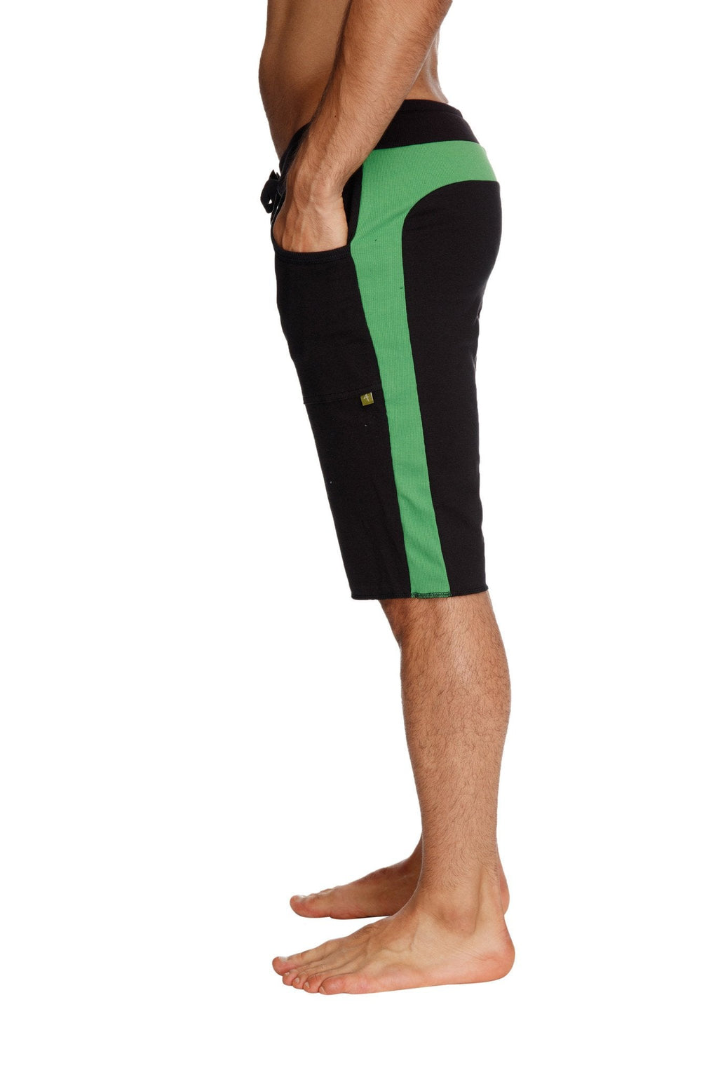 Eco-track short black with bamboo green featuring a bold vertical stripe down the side in boardshort style