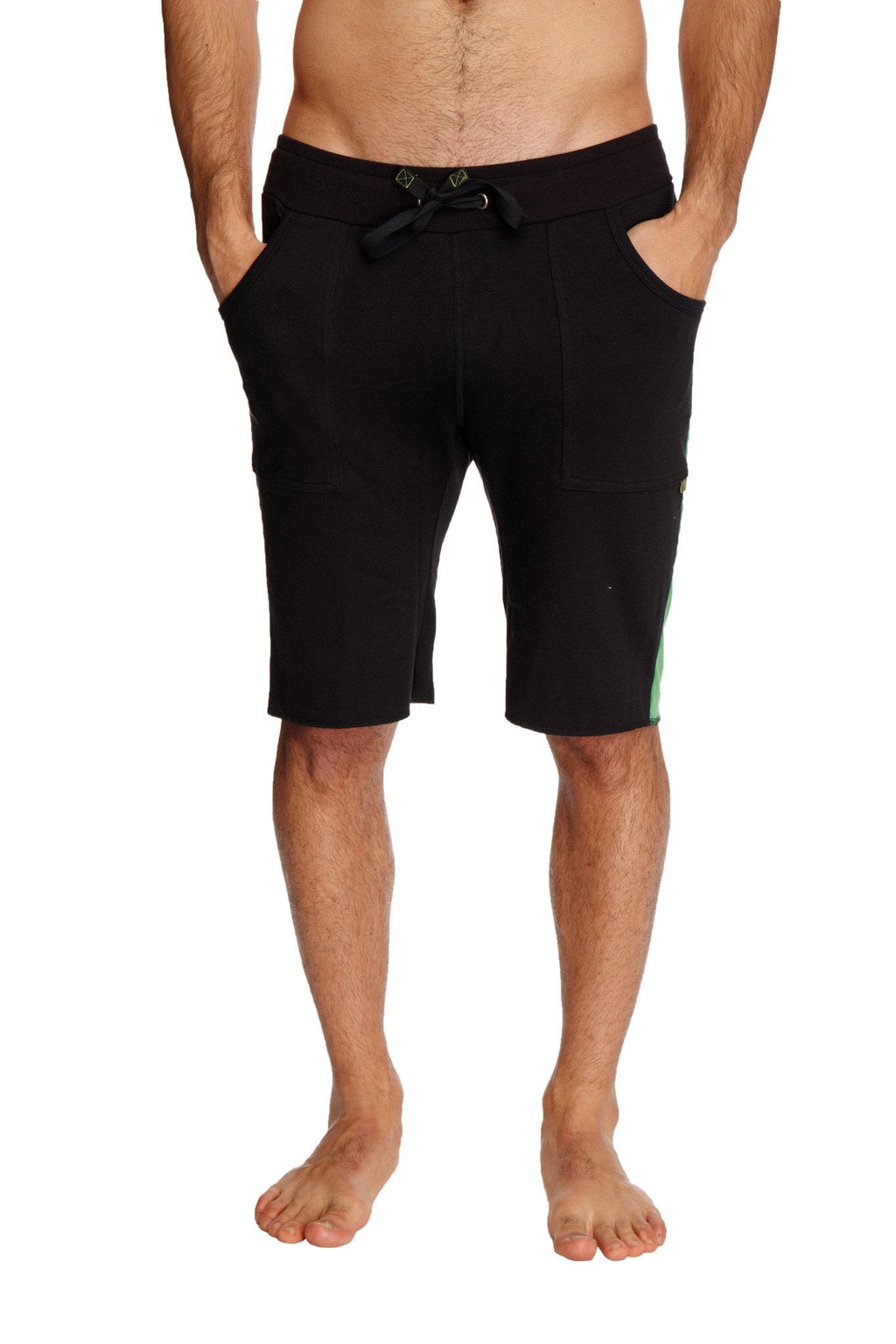 Black eco-track athletic shorts with drawstring waistband and subtle bamboo green side panels for active wear