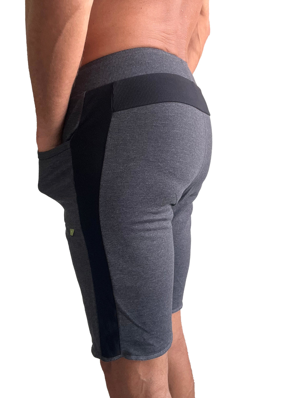 Eco-track short charcoal with black athletic shorts with ribbed waistband side panels and green logo on thigh
