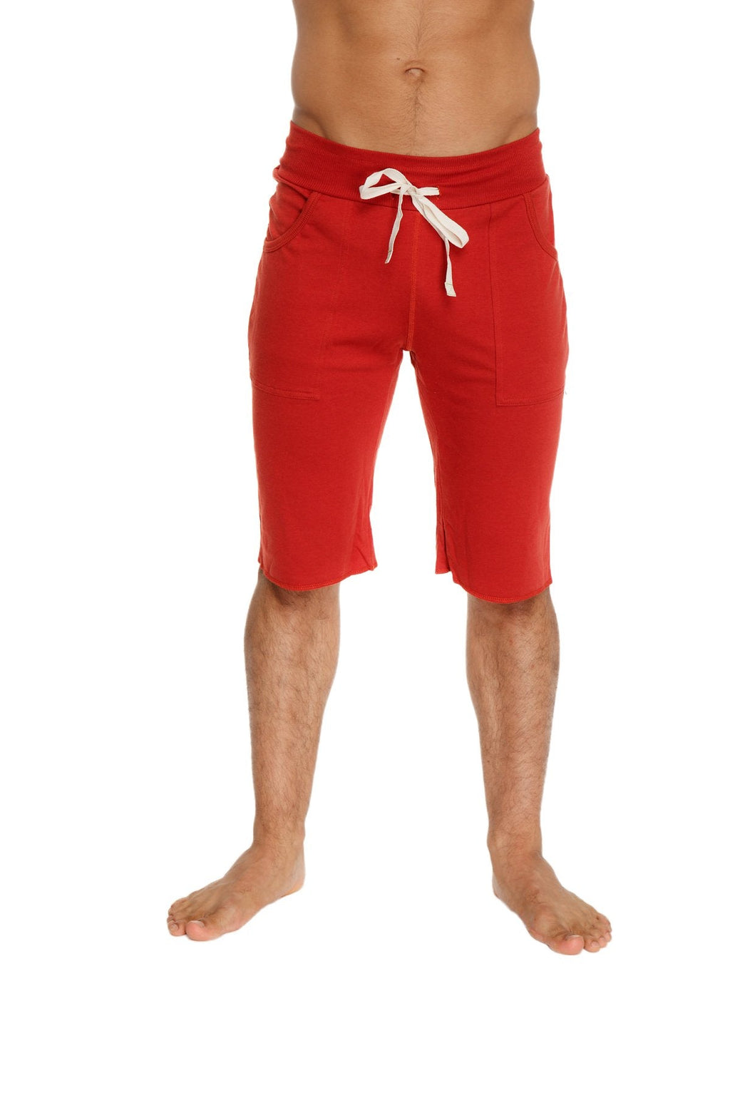 Red eco-track athletic shorts with white drawstring waistband and side pockets in cinnabar color