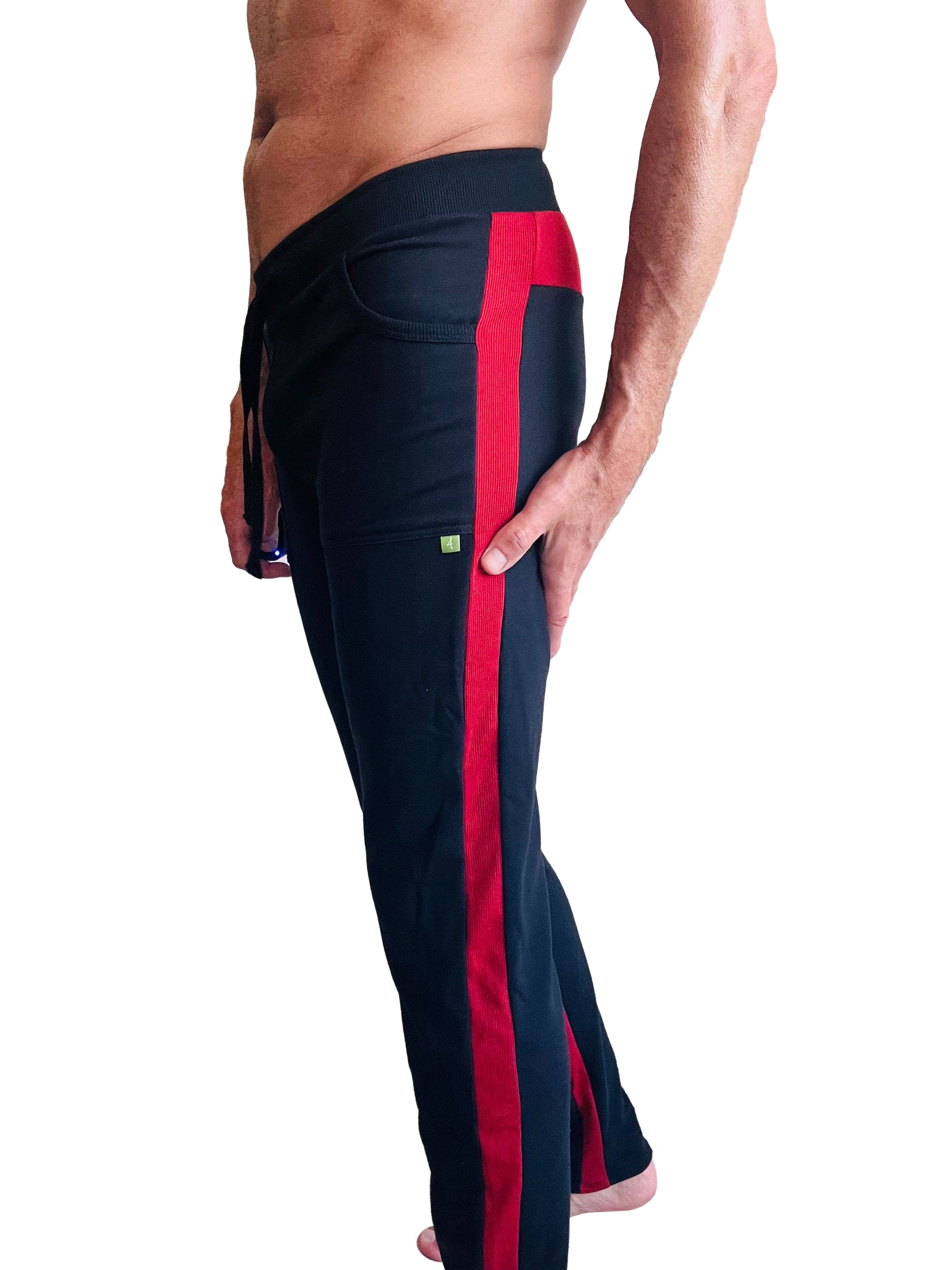 Eco-track and yoga sweat pant in black with cinnabar red stripe drawstring waist and small green logo on thigh