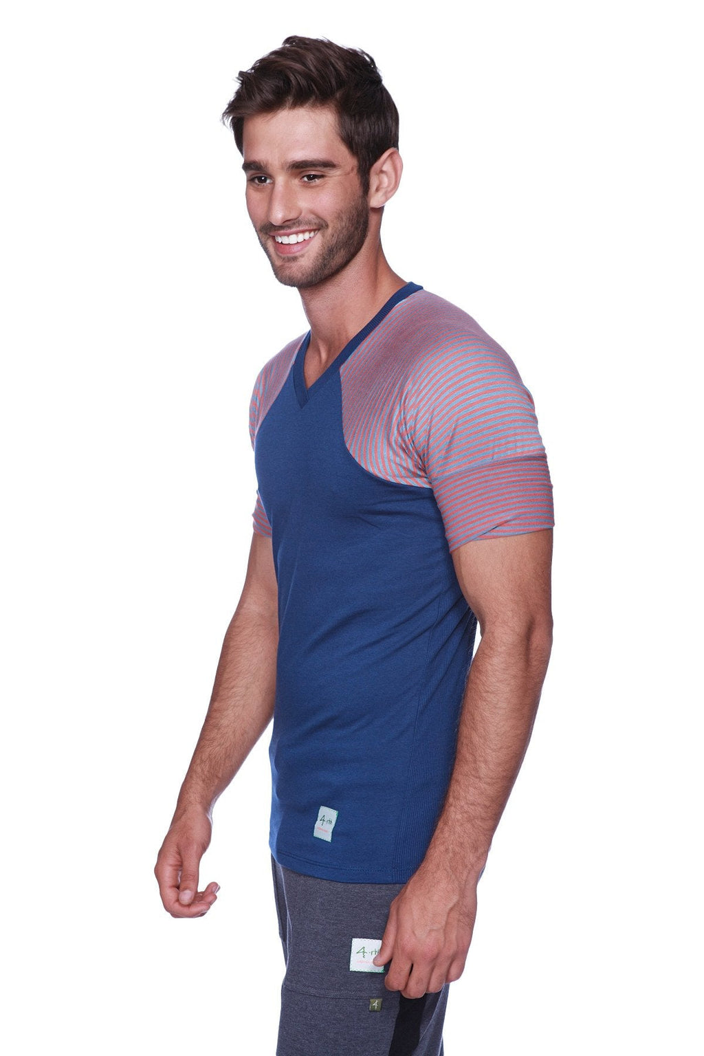 Blue and pink color-blocked v-neck athletic t-shirt paired with eco-track and yoga charcoal black sweat pant