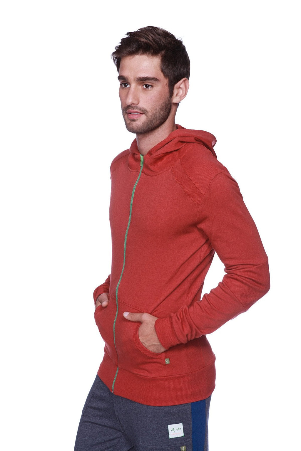 Red zip-up hoodie with matching hood and green zipper trim paired with charcoal and royal blue eco-track yoga sweatpants