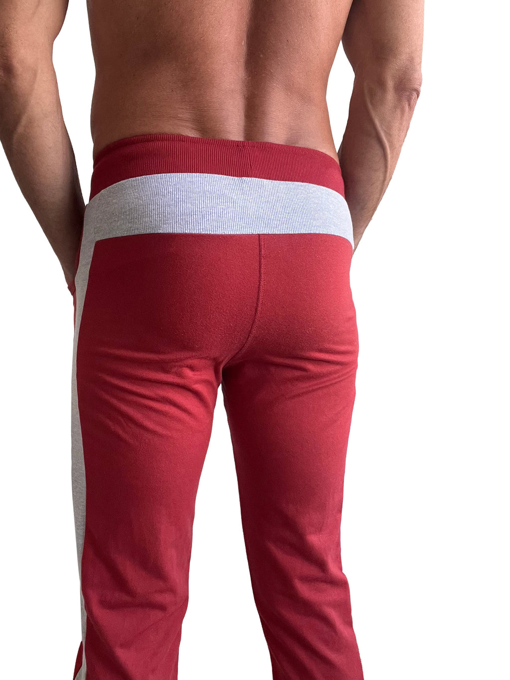 Eco-track and yoga sweat pant in cinnabar red with white and gray striped waistband and side stripes