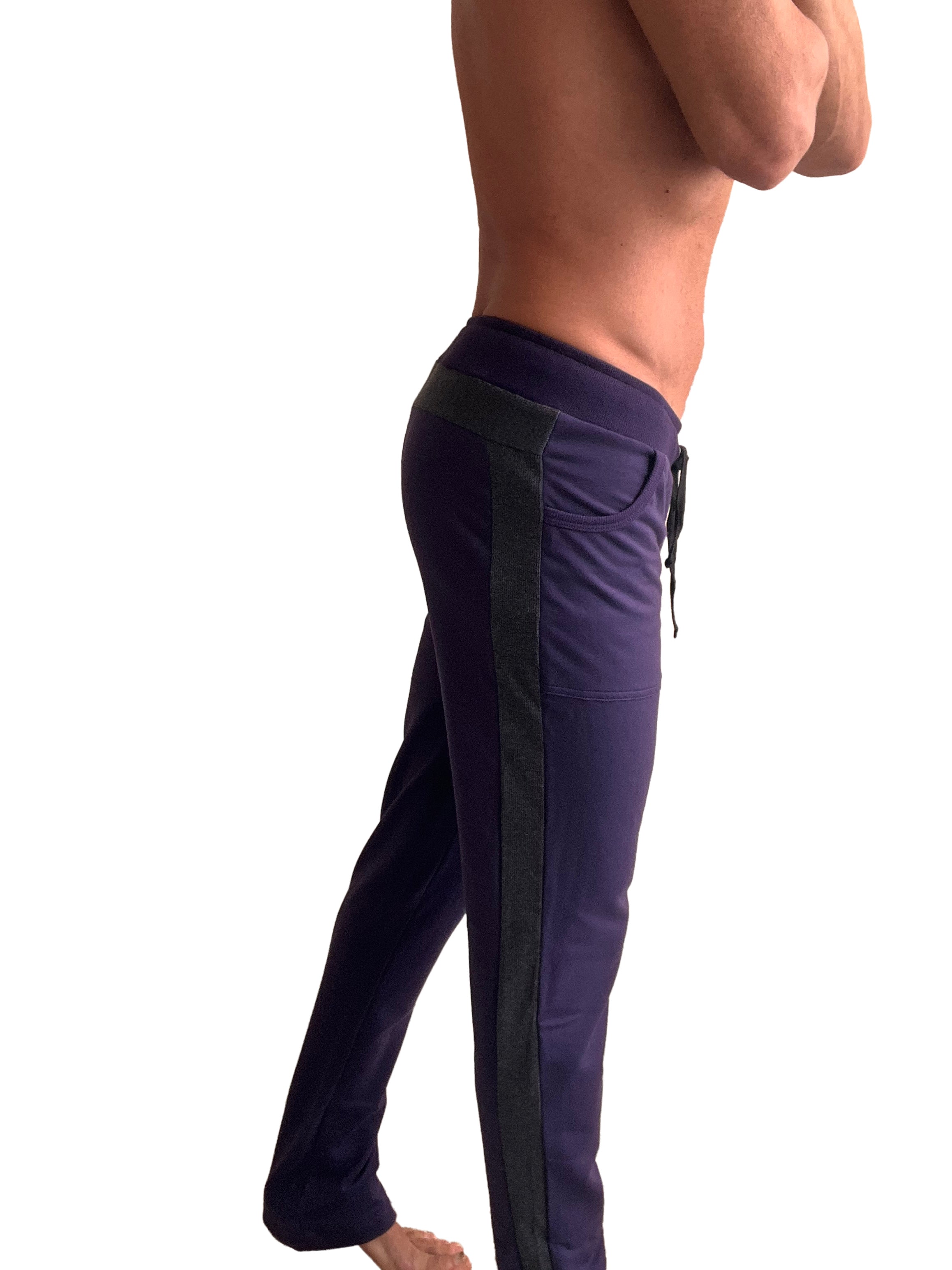 Eco-track and yoga sweat pant in dark purple with black side panels and drawstring waistband for athletic use