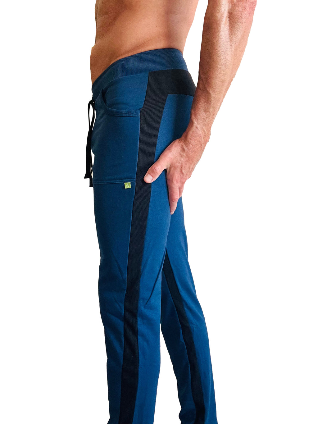 Royal blue eco-track and yoga sweat pant with black side stripes and drawstring waistband made for athletic wear