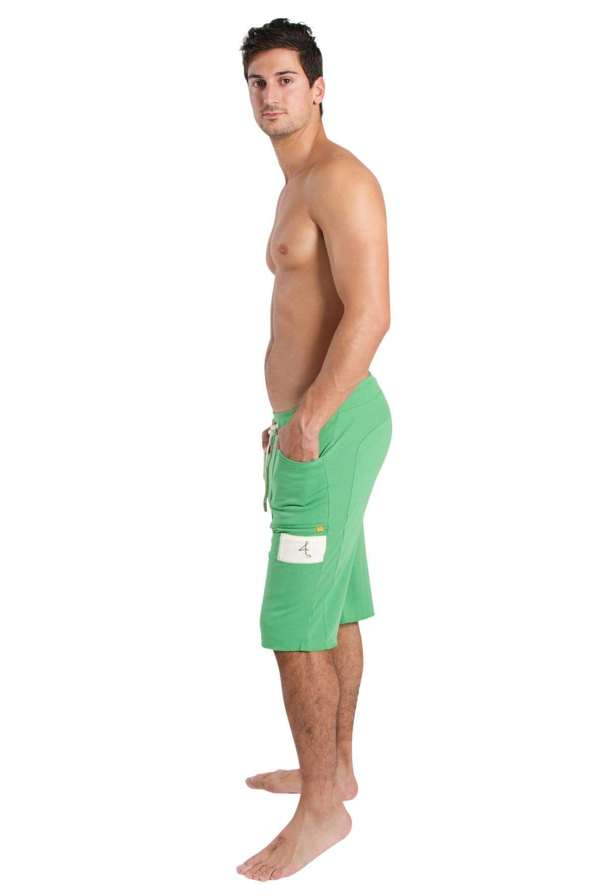 Edge eco-track shorts in bamboo green with a white patch on the side pocket made from sustainable fabric