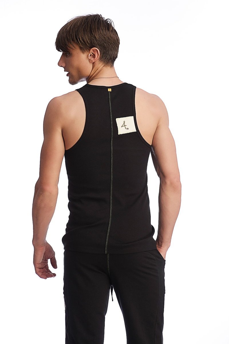 Back view of black edge sustain tank top with sleeveless design and central zipper made of breathable fabric