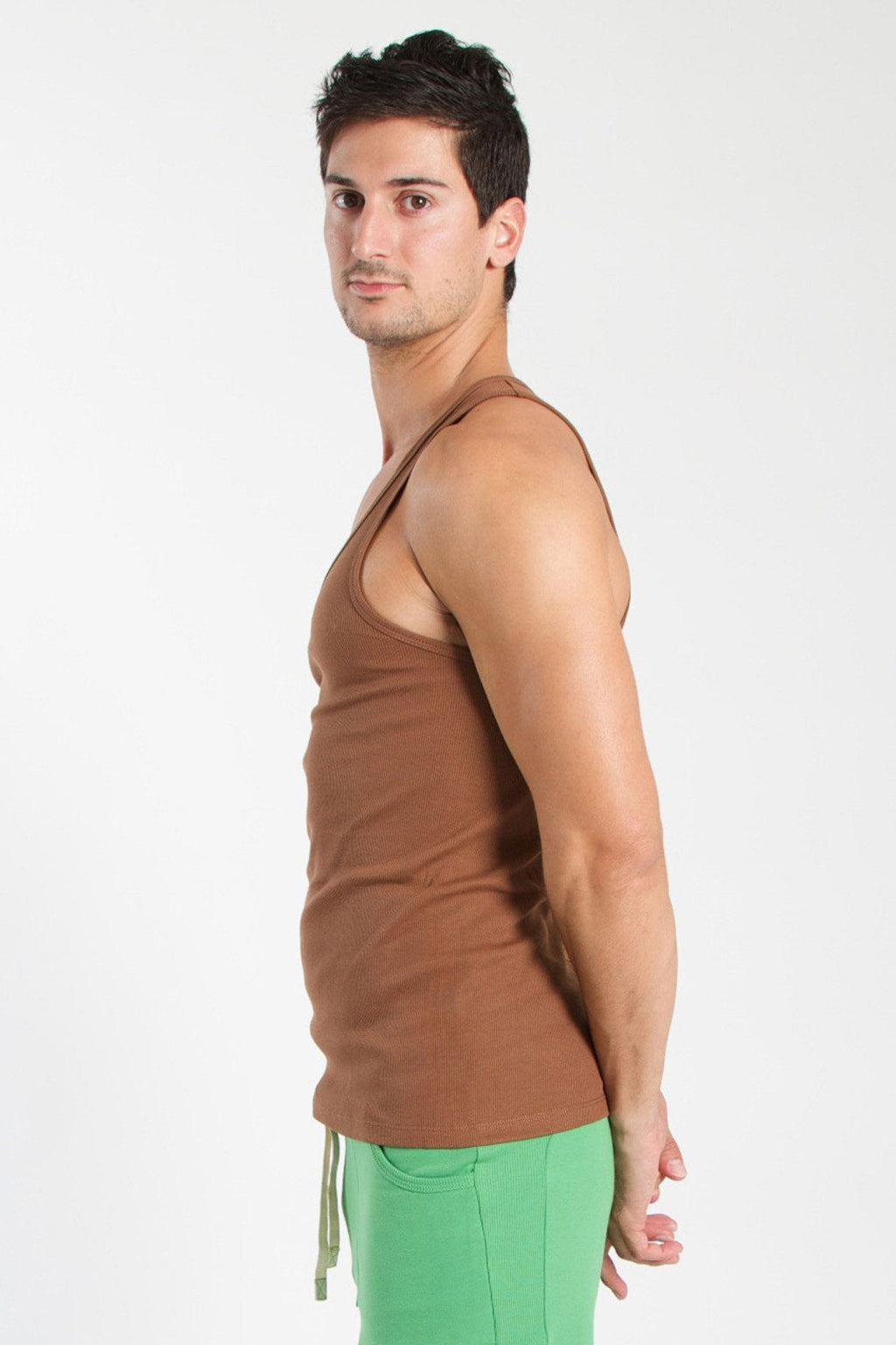 Brown sleeveless edge sustain tank top in chocolate with a simple fitted design for casual wear