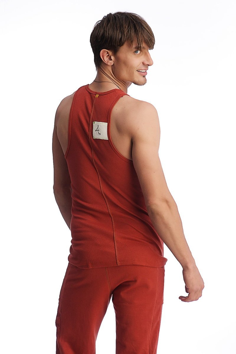 Back view of red cinnabar edge sustain tank top with white label showing sleeveless design and lightweight fabric