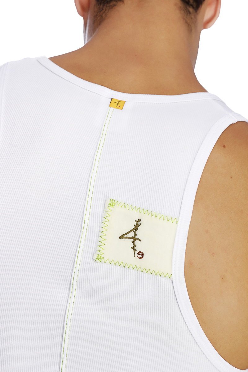 White ribbed sleeveless edge sustain tank top with cream patch featuring black embroidery and lime green zigzag stitching