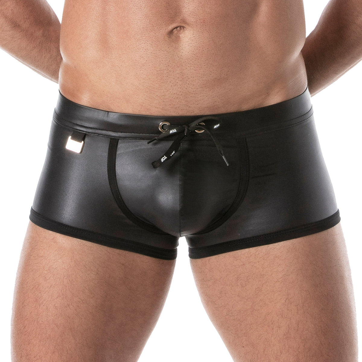 Fetish swim trunks in black patent leather with drawstring waistband and side pockets for stylish beachwear