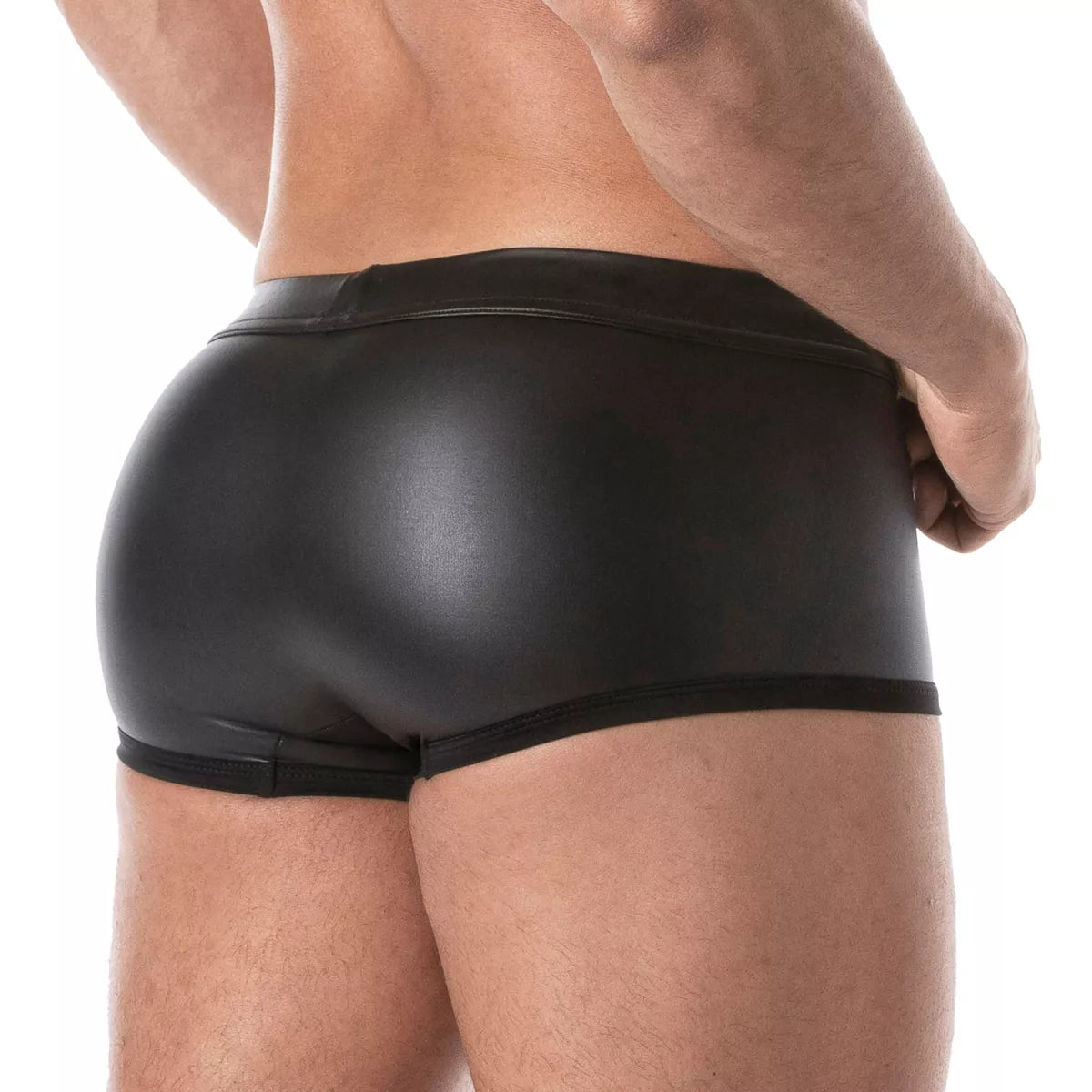 Black glossy faux leather fetish swim trunks with a sleek form-fitting design for swimwear and beachwear use