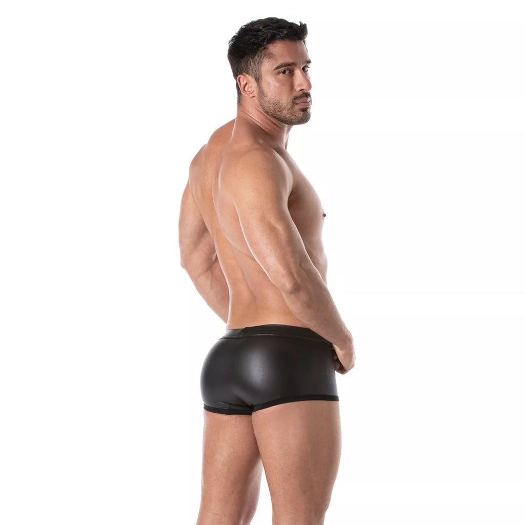 Black glossy faux leather fetish swim trunks with sleek form-fitting design for bold swimwear style