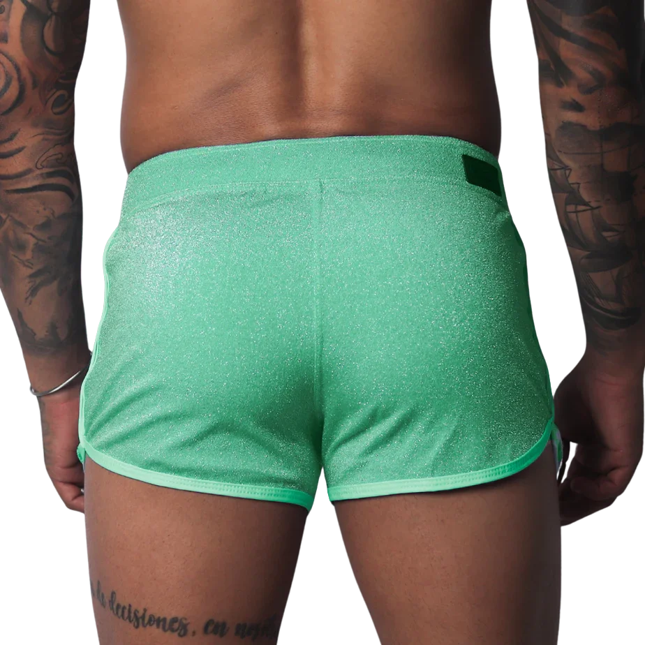 Flash green, shimmering athletic-style shorts with contrast trim and a rear waistband tab.
